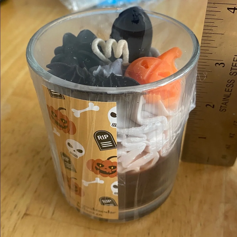 Spooky Themed Halloween candle in glass w pumpkin bats more Candle is sealed NWT